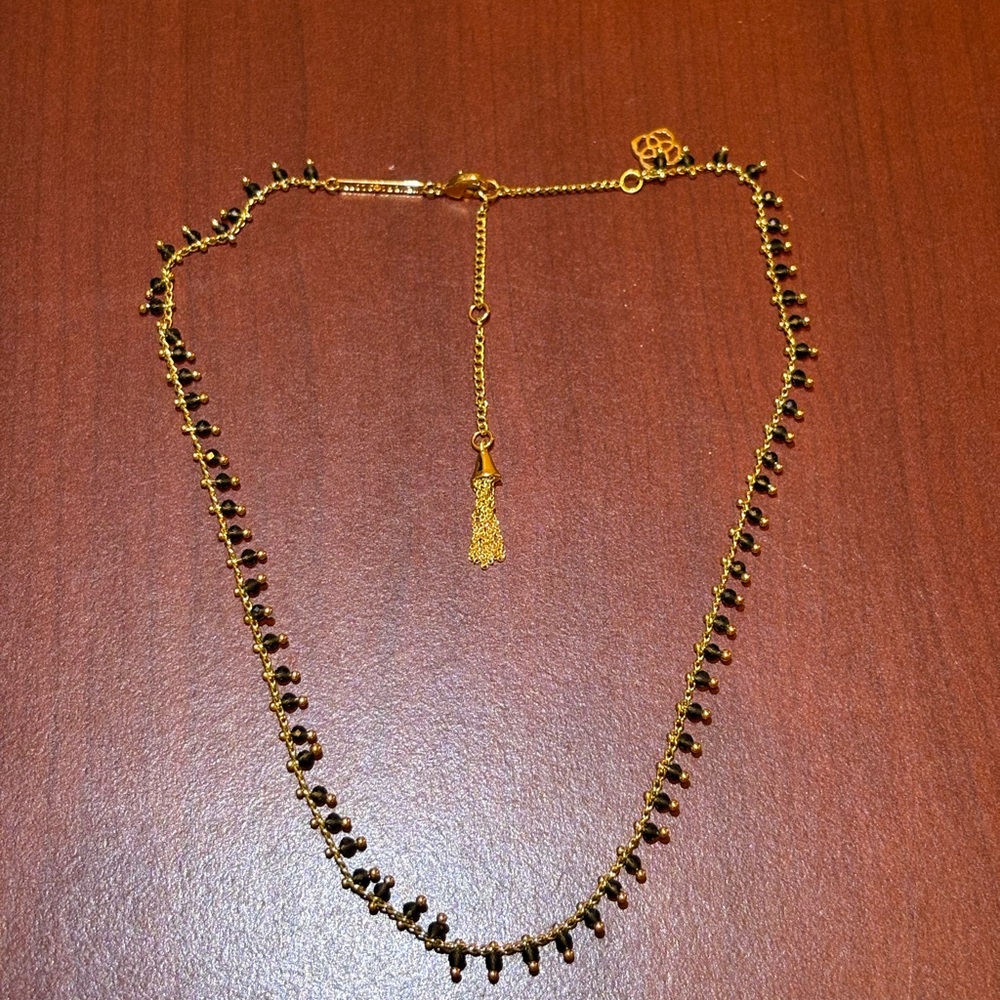 Elegant Gold and Black Beaded Necklace